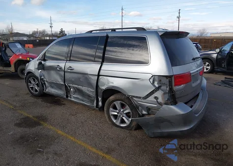 2009 Honda Odyssey Touring z USA, uszkodzony, nr VIN 5FNRL38959B020293